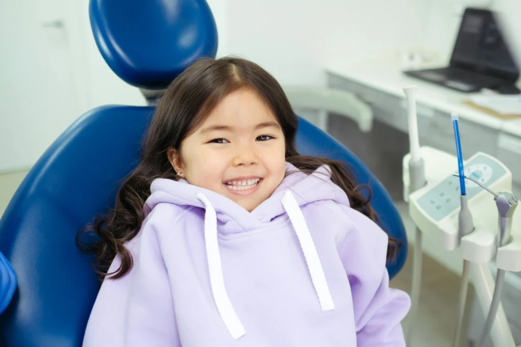 Girl sitting in a dentist chair