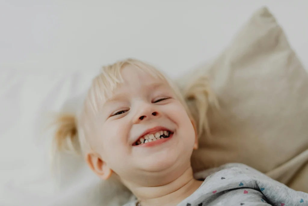 Blond girl smiling